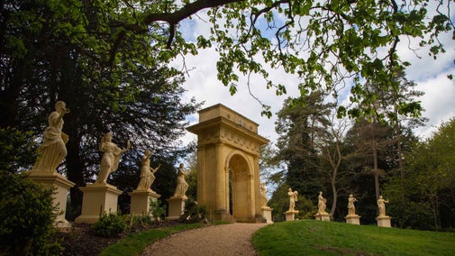 The Doric Arch at Stowe, Buckinghamshire, flanked on either side of the recently returned statues of the Nine Muses
